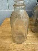 Collection of Glass Milk Bottles with Wooden Crate