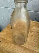 Collection of Glass Milk Bottles with Wooden Crate