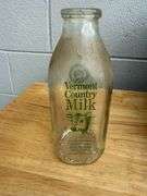 Collection of Glass Milk Bottles with Wooden Crate