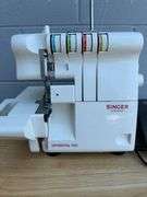 Singer Ultralock Serger Sewing Machine with Accessories and Sewing Patterns