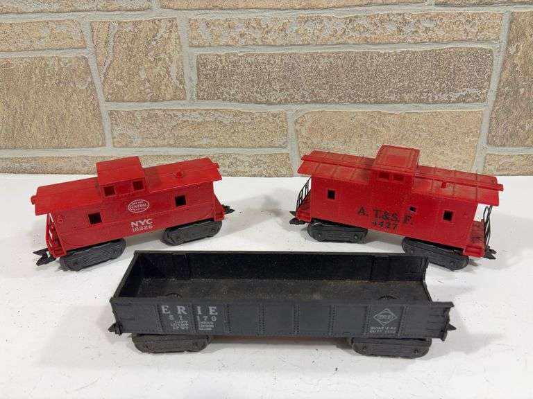 3 - Marx Rolling Stock; ERIE #51170 Gondola, AT&SF #4427 Caboose, Nee York Central NYC #18326 Caboose. image