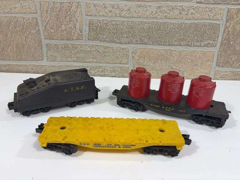 3 - Lionel Rolling Stock; ATSF Tender, ATSF #9022 Flat Car w/ 3 tanks, C & O #9024 Flat Car image