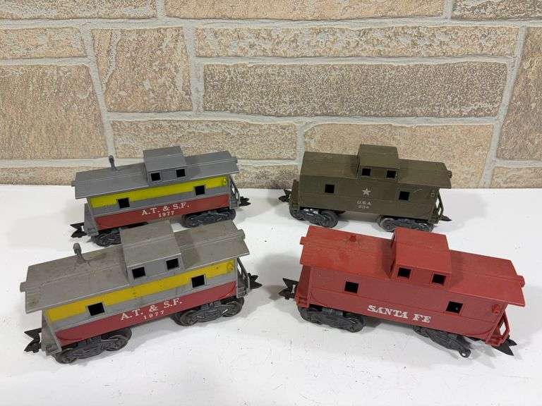 3 - Marx Rolling Stock Cabooses; (2) AT&SF #1977, USA #234, Santa Fe image