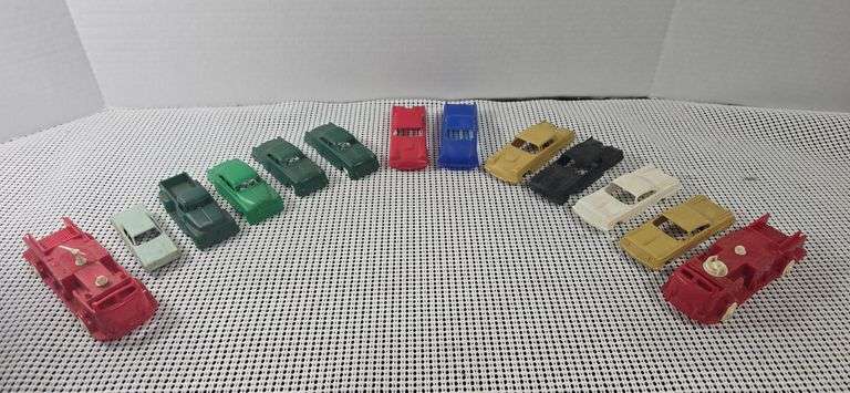 Assortment of plastic vehicles. Some are Plasticville image