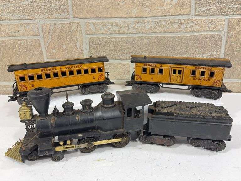 Marx “Tales of Wells Fargo” 4pc Train Set;  Wm. Crooks #1  4-4-0 Locomotive, Tender, St Paul & Pacific #1 Baggage and #3 Passenger Cars image