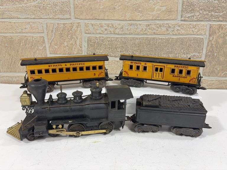 Marx “Tales of Wells Fargo” 4pc Train Set.  - Wm. Crooks #1  4-4-0 Locomotive, Tender, St Paul & Pacific #1 Baggage and #3 Passenger Cars image