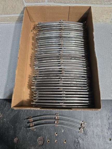 Collection of Lionel 3-rail curved track sections - 39 pieces image