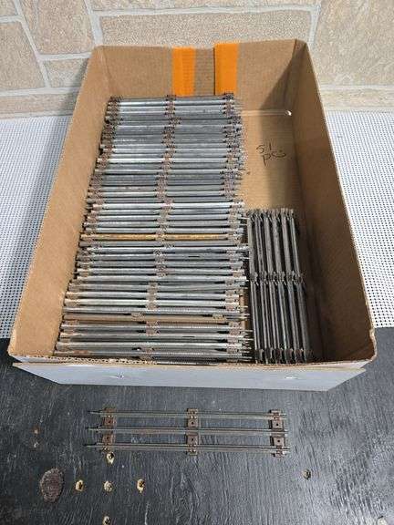 Collection of Lionel 3 rail track, 9" sections - 51 pieces image