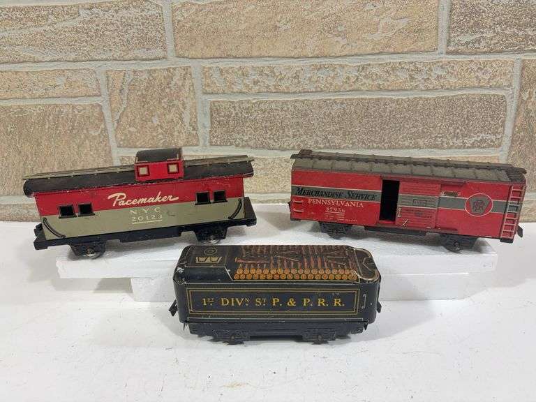 3 - Marx Tin Rolling Stock; Pacemaker NYC #20123 Caboose, Merchandise Service Pennsylvania #37956 Box Car, 1st Division St. P. & P.R.R. Tender image