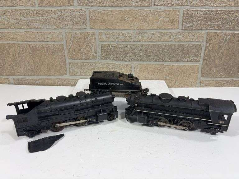 3 - Marx Broken Rolling Stock; #1666 2-4-2 Locomotive (broken cab); #666 2-4-2 Locomotive (missing front wheel set), Penn Central Tender (missing a pair of wheels) image