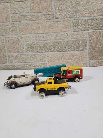 Set of 4 assorted toy cars image