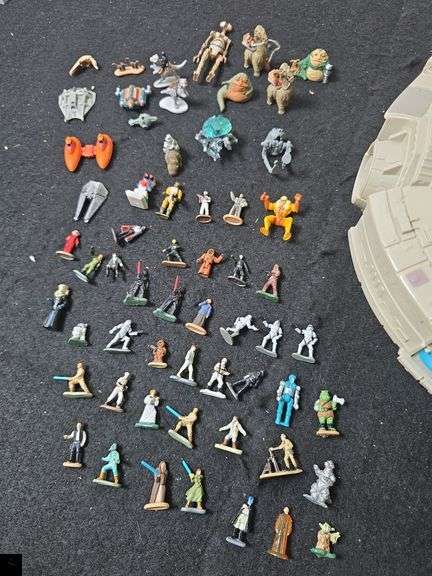 1995 Star Wars Micro Machines Millennium Falcon playset with figurines.