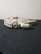1995 Star Wars Micro Machines Millennium Falcon playset with figurines.