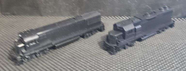 Two Unbranded Black Powered Locomotives