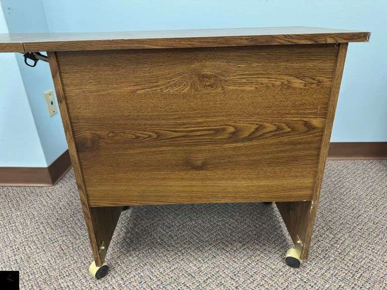 Rolling credenza with drop leaf side