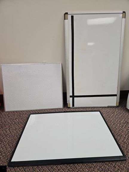 Three dry erase boards