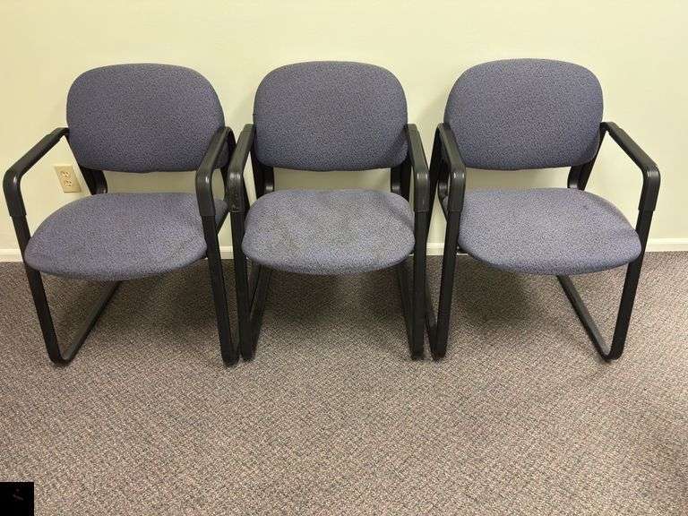 Set of three upholstered office chairs