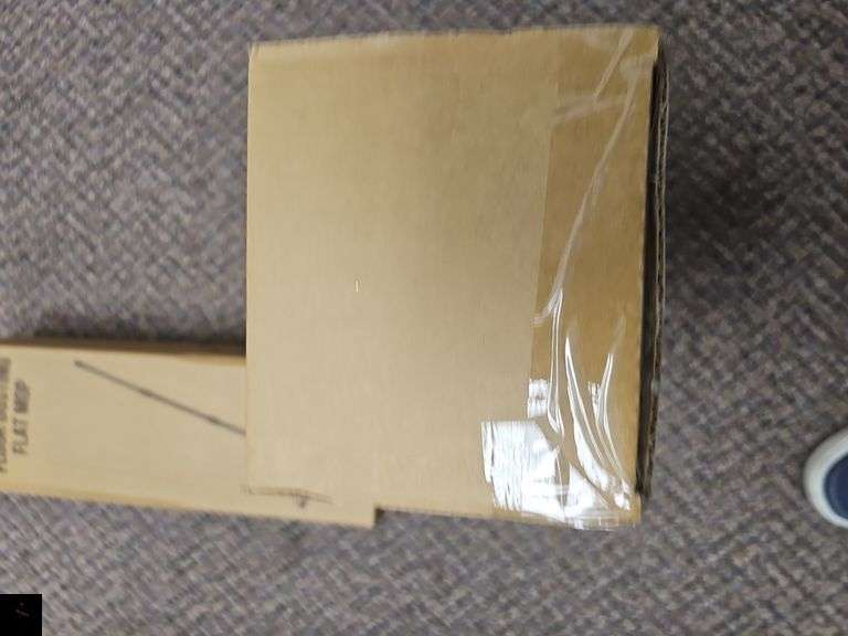 Wet and dry floor dusting flat mop. New in packaging