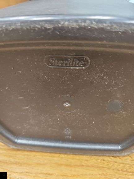 Two sterilite waste baskets