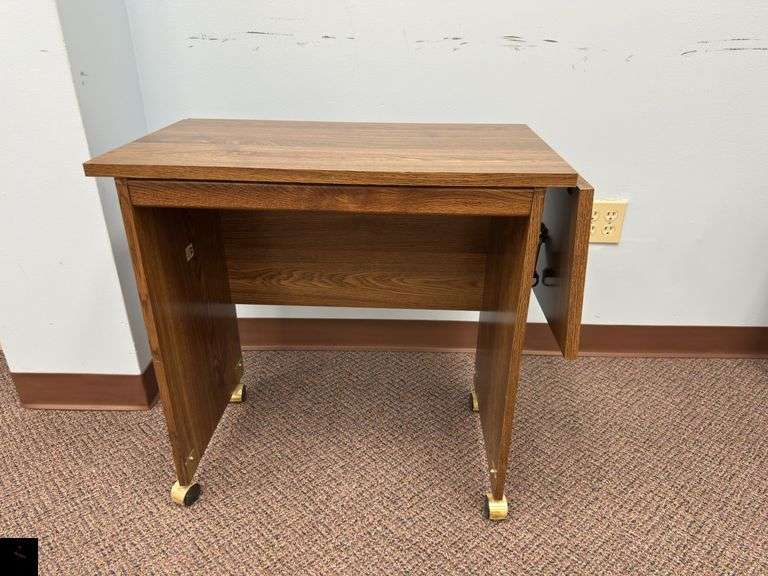 Rolling credenza with drop leaf side
