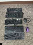 Three wired keyboards, two wireless keyboards, a wired mouse and a wireless mouse