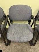 Set of three upholstered office chairs