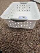 Eight sterilite plastic storage baskets