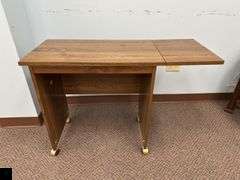 Rolling credenza with drop leaf side