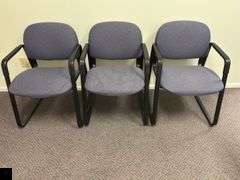 Set of three upholstered office chairs