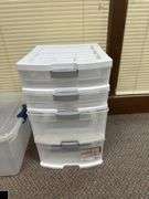 Four-Drawer plastic storage chest and a 66-Qt storage tote with lid