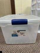 Four-Drawer plastic storage chest and a 66-Qt storage tote with lid