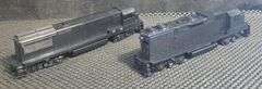 Two Unbranded Black Powered Locomotives