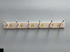 One New and Four Used Hook Boards