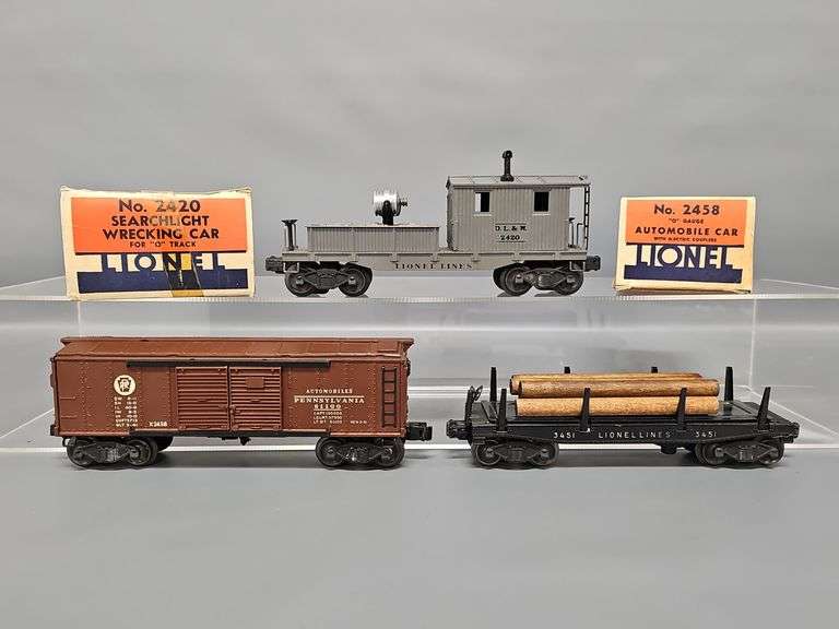 Lionel Postwar O 2458 box car, 3451 Log Car and 2420 Searchlight Caboose w/ Two OBs image