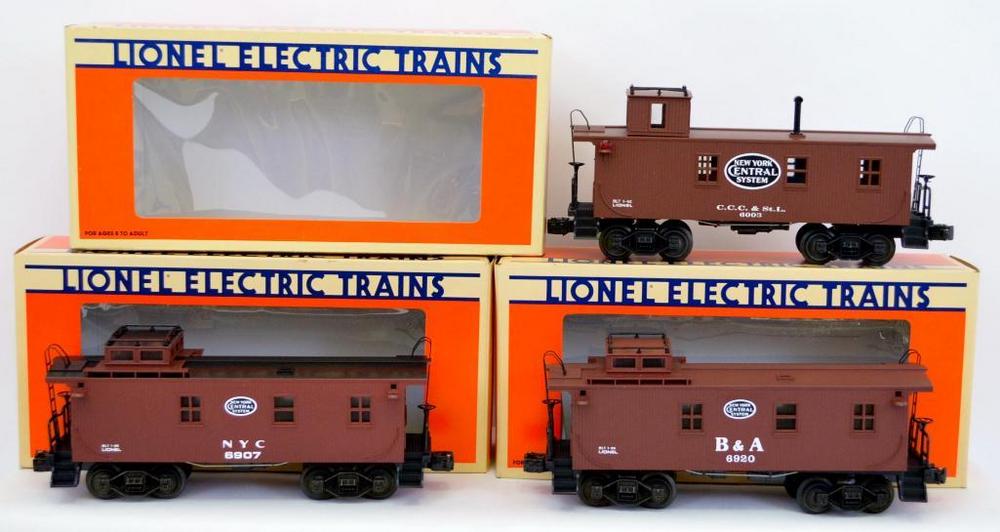 Three Lionel O gauge cabooses in original boxes 6907 6920 6003
