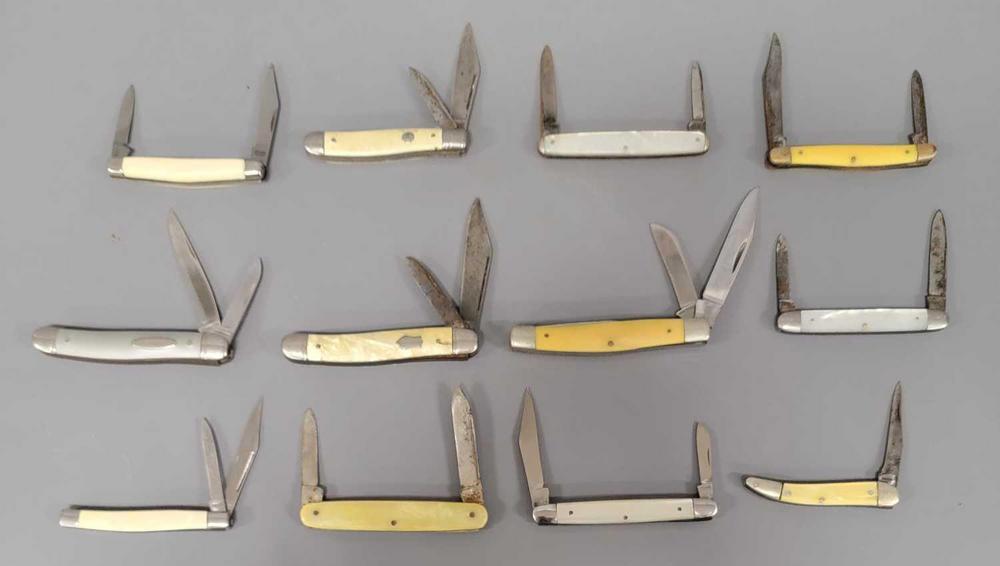 Group of twelve smaller old pocket knives