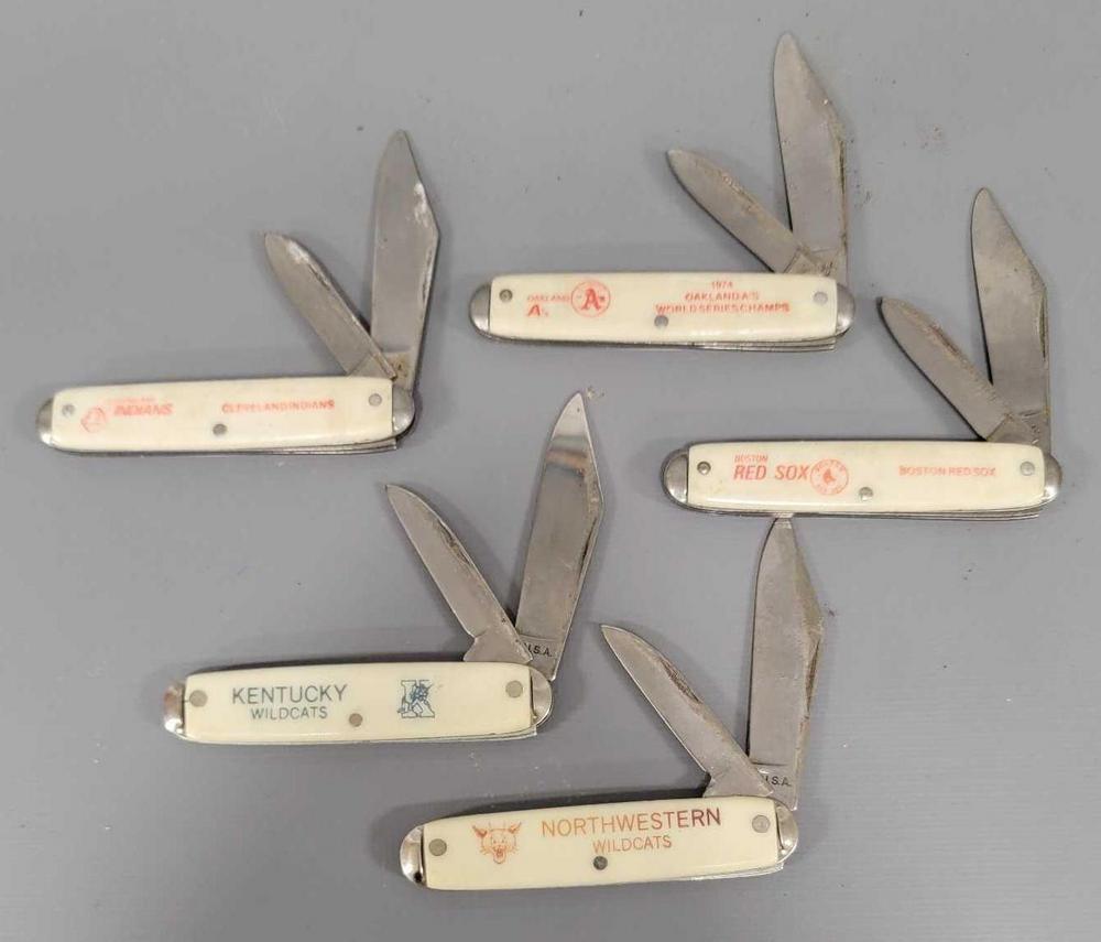 Group of five old sports team pocket knives