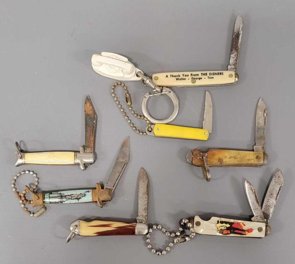 Group of seven old small keychain pocket knives