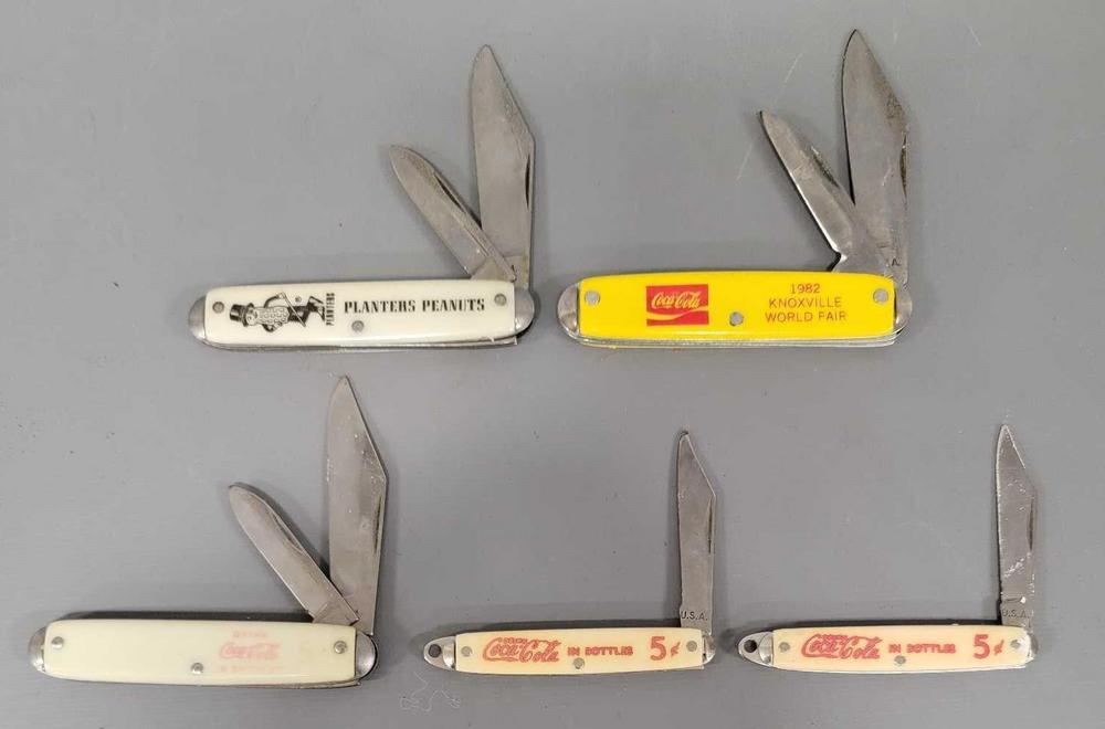Group of five old advertising pocket knives Coca Cola Planters