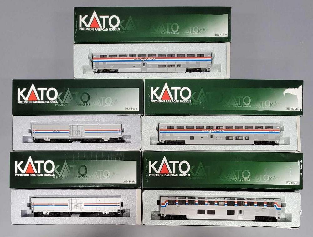 Five Kato HO scale Amtrak Phase III superliner cars in original boxes