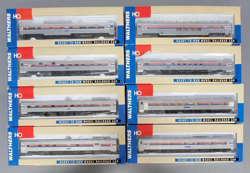 Eight Walthers HO scale Amtrak phase 1 passenger cars in original boxes