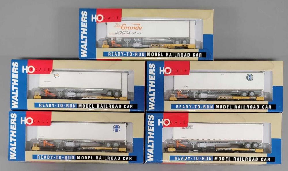 Five Walthers HO scale front runners with 48' van trailer in original boxes