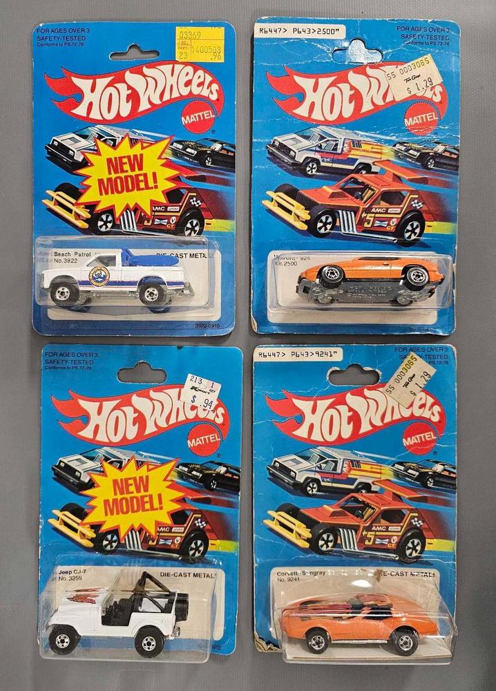 Four Blackwall Hot Wheels on blister cards