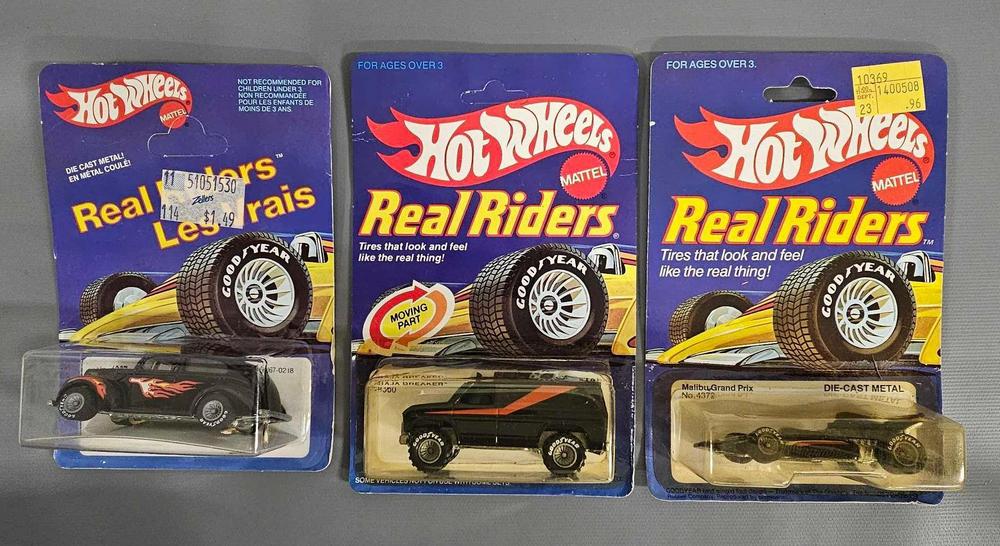 Three Mattel Hot Wheels Real Riders on blister cards