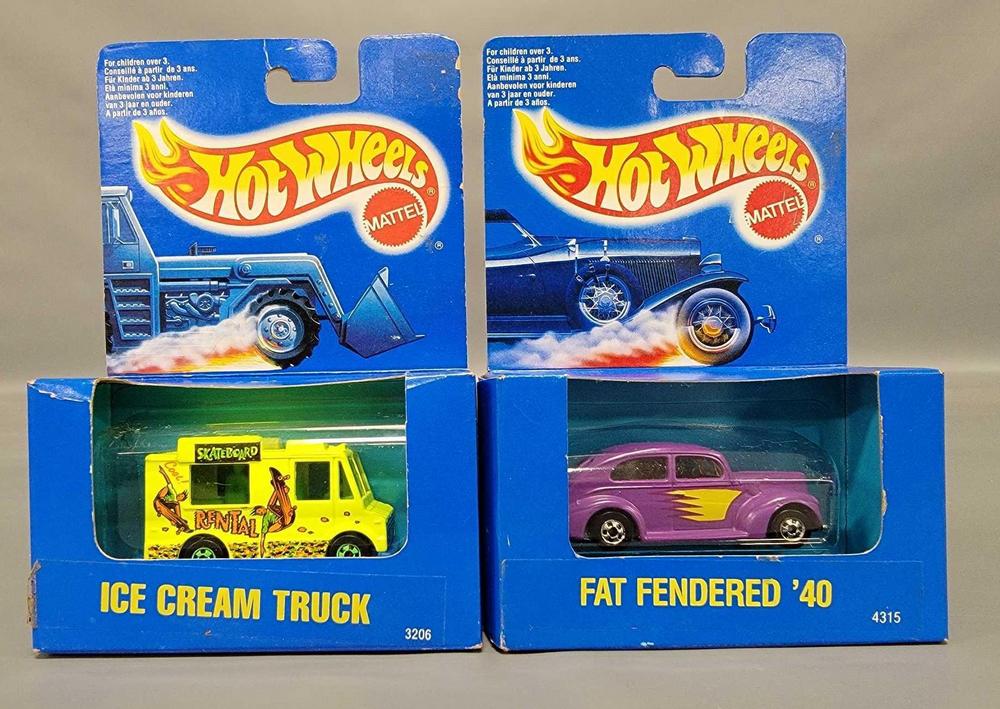 Two Hot Wheels international cars in original boxes