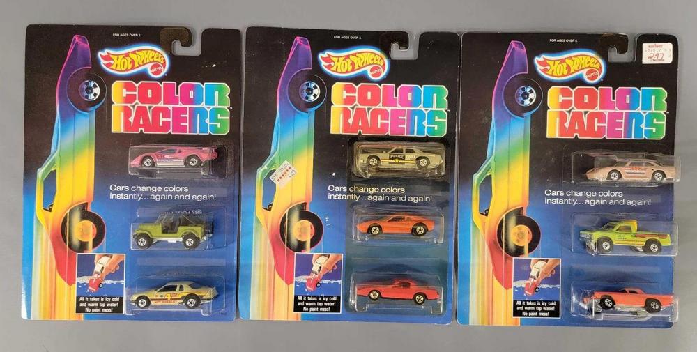 Three Hot Wheels Color Racers three car sets on blister cards