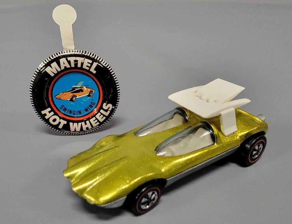 Redline Hot Wheels yellow Swingin Wing with button