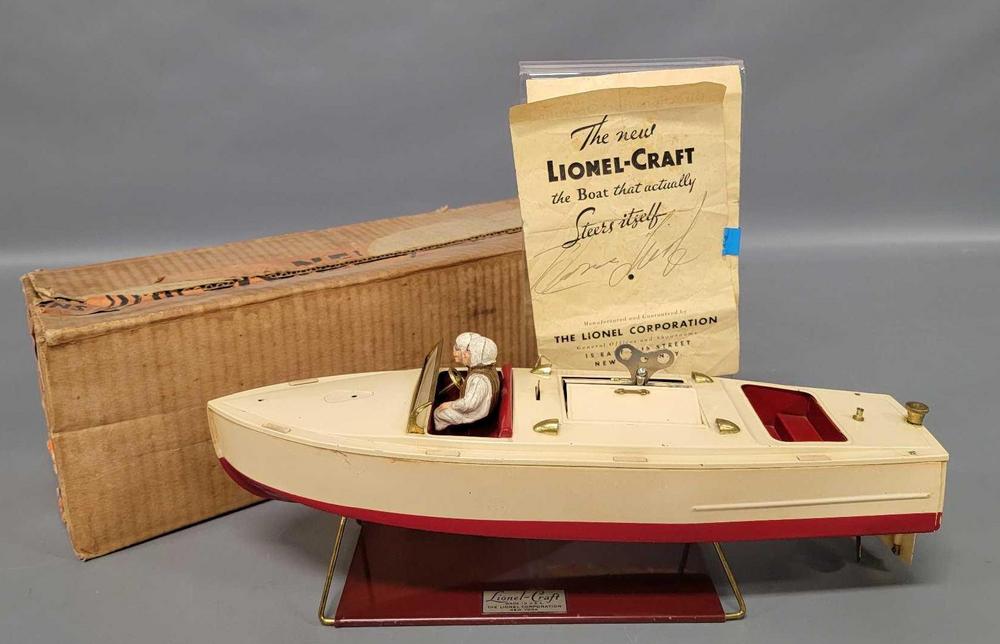 Original Lionel Craft Model MB wind-up boat in original box with stand