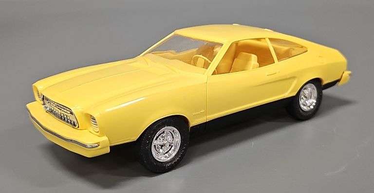 1975 Ford Mustang II coaster promo car with 1974 Dodge Charger original box image