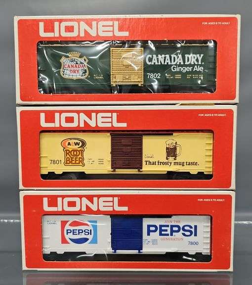 Three Lionel MPC era O box cars in original boxes